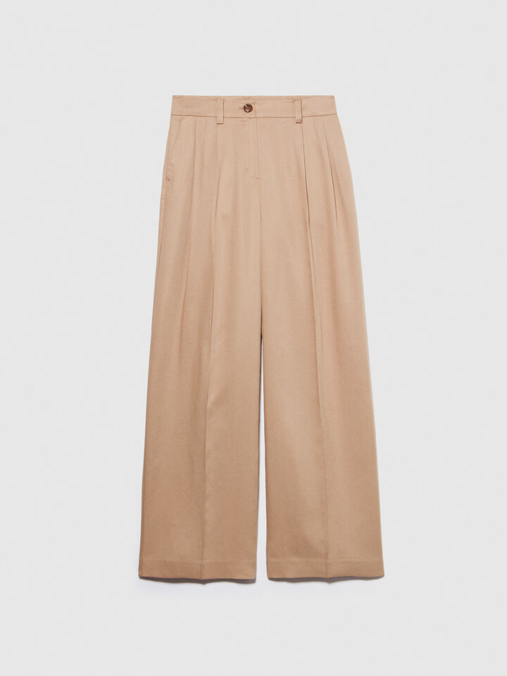 Low-waisted flare trousers - women's flared trousers - Beige | Sisley image number 6
